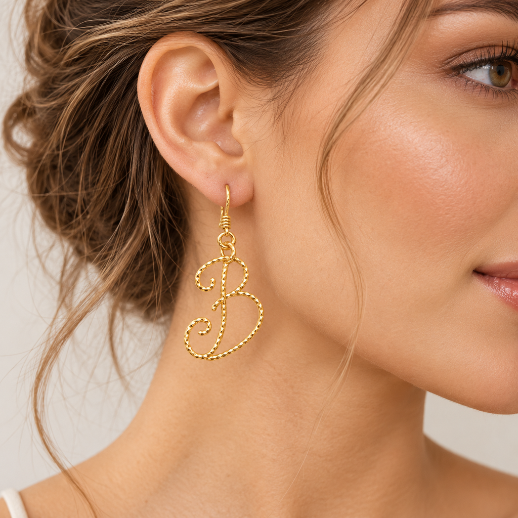 Personalized gold twisted wire initial A earring on model