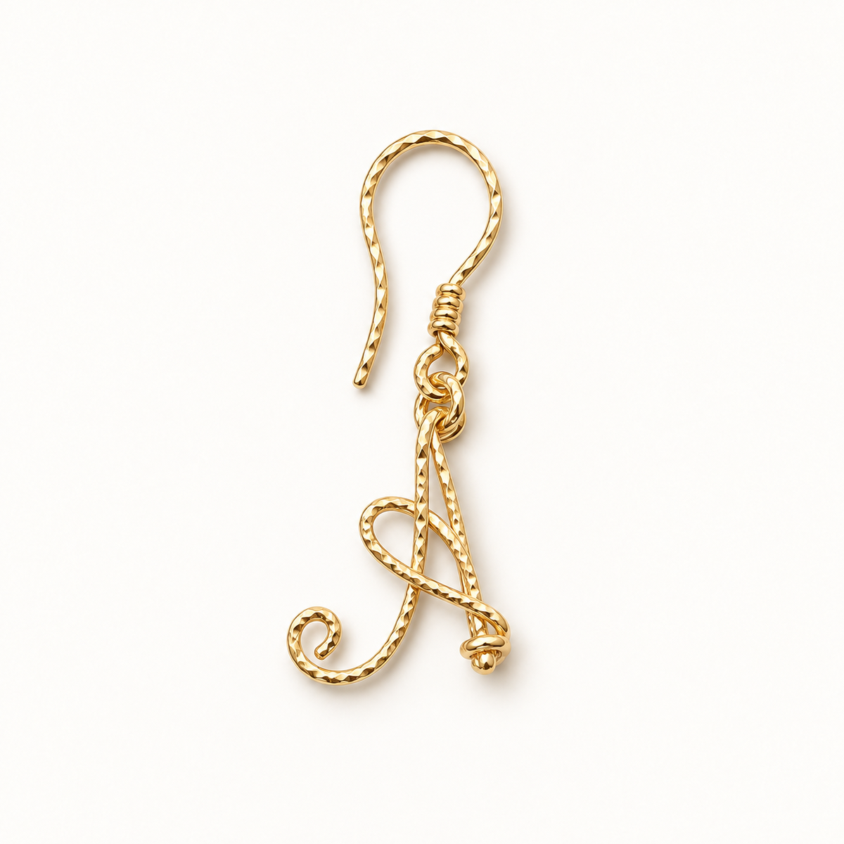 Personalized gold twisted wire initial A earring on white background