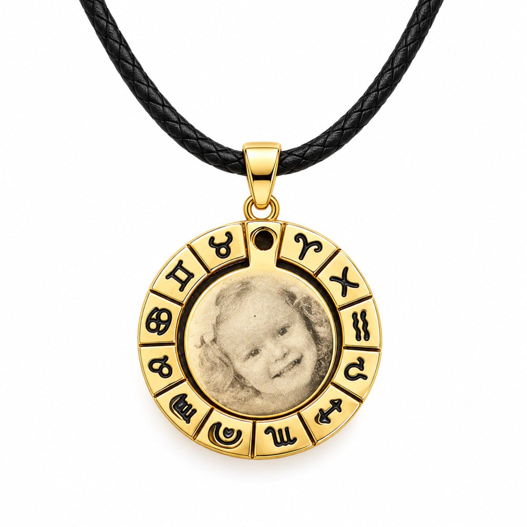 Gold-coloured zodiac pendant with black leather cord and personalized photo engraving