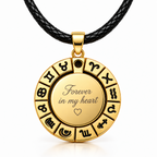 Gold-coloured zodiac pendant with black leather cord and personalized text engraving